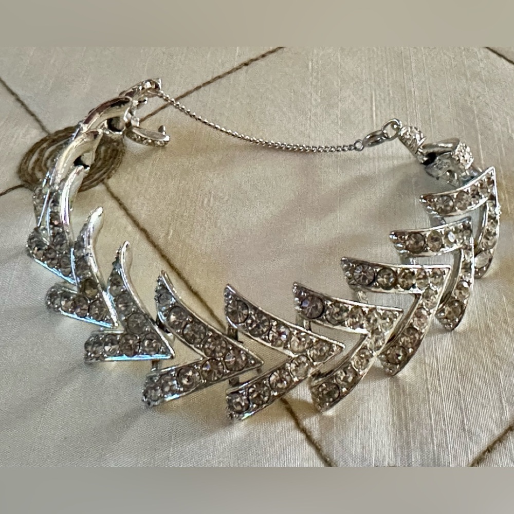 Vintage rhinestone bracelet. Silver metal and lots of bling w/extra safety chain
